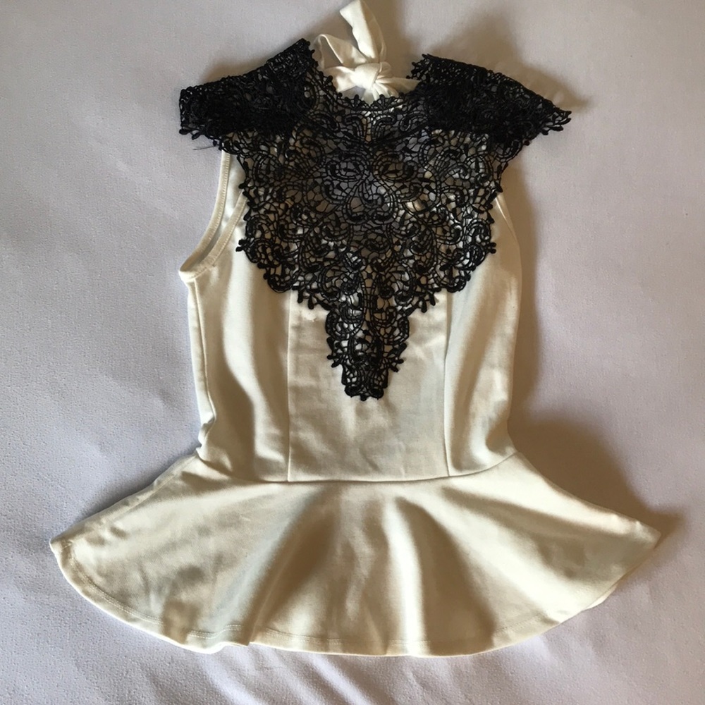 Charlotte Russe white peplum top with black lace